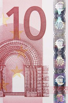 Closeup photo of a part of ten euro note including hologram. Macro photo.
