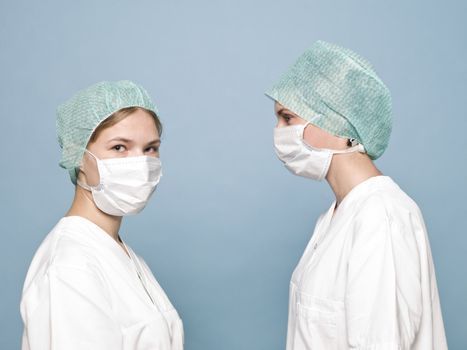 Two women with surgical masks