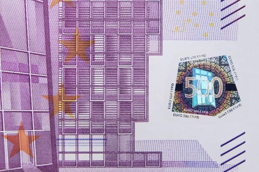 Closeup photo of a part of five hundred euro note including hologram. Macro photo.