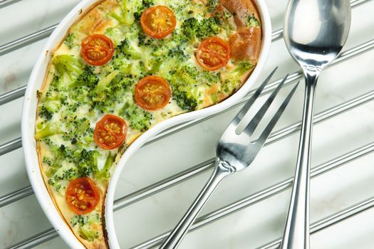 cake with broccoli and cherry tomatoes