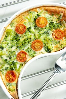 cake with broccoli and cherry tomatoes