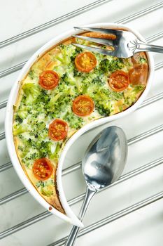 cake with broccoli and cherry tomatoes