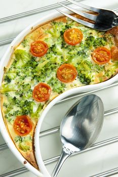 cake with broccoli and cherry tomatoes