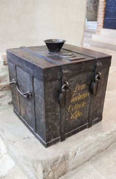 Donations collecting box in a Medieval Cathedral. Turku, Finland.