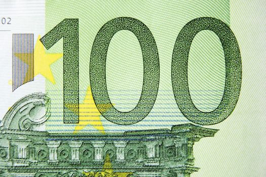 Closeup photo of a part of a hundred euro note. Macro photo.