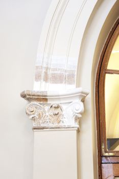Closeup photo of details of arch in a historical public library.