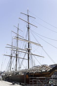 An old sailing ship "Estrella" is under renovation.