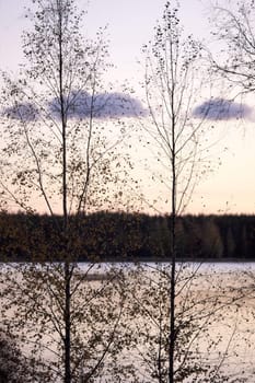 Lake landscape by sunset.