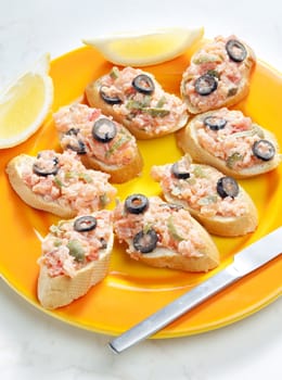 salmon tartare with capers and black olives