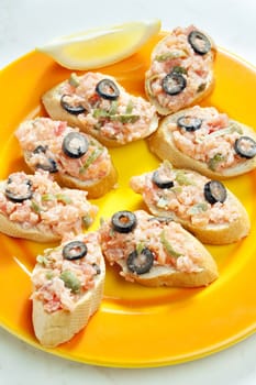 salmon tartare with capers and black olives