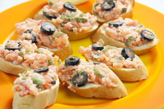 salmon tartare with capers and black olives