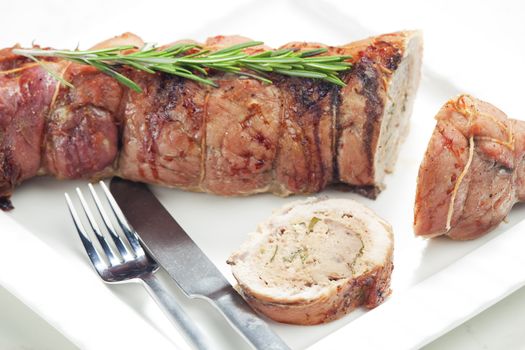 veal roll filled with minced beef meat and herbs