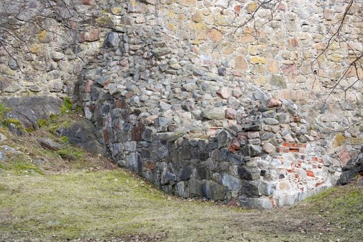 Ruins of a medieval castle in spring.