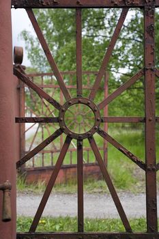 Close-up photograph of an old garden gate.