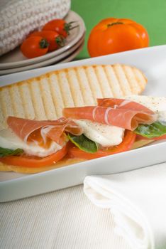 panini sandwich with fresh caprese and parma ham