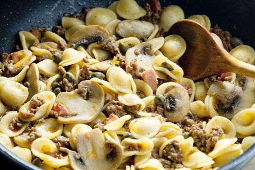 pasta orecchiette with bacon and champignons