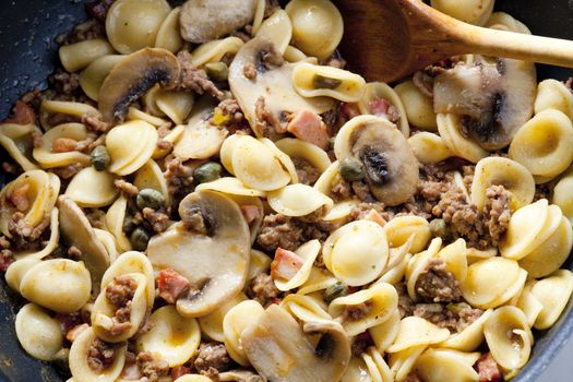 pasta orecchiette with bacon and champignons