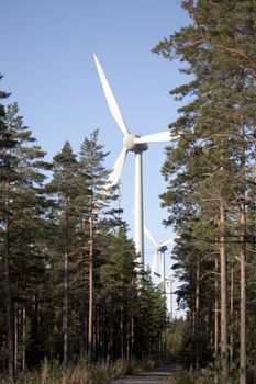 Modern windmill producing renewable energy ecologically.