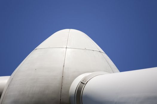 Modern windmill producing renewable energy ecologically.