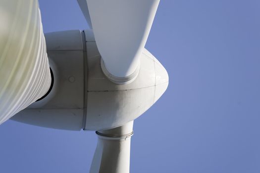 Modern windmill producing renewable energy ecologically.