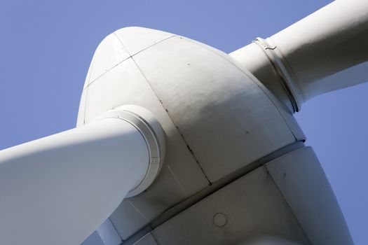 Modern windmill producing renewable energy ecologically.