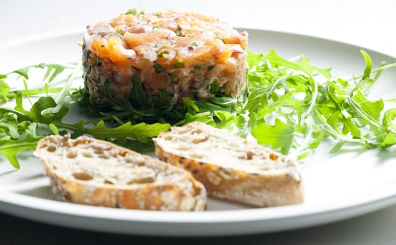salmon tartare with ruccola