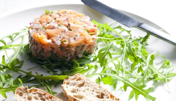 salmon tartare with ruccola