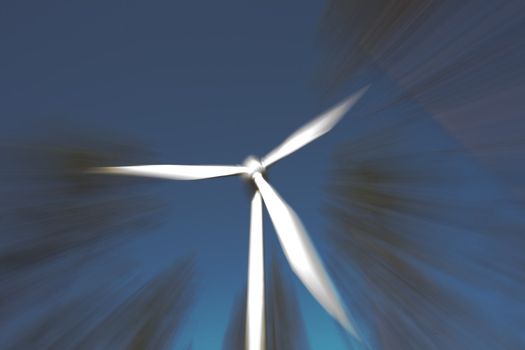 Modern windmill producing renewable energy ecologically.