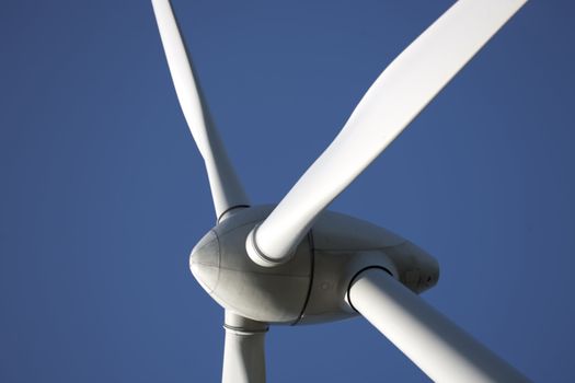 Modern windmill producing renewable energy ecologically.