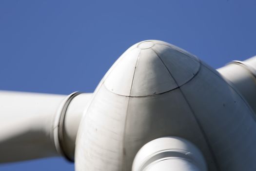 Modern windmill producing renewable energy ecologically.