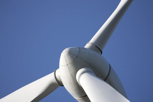 Modern windmill producing renewable energy ecologically.