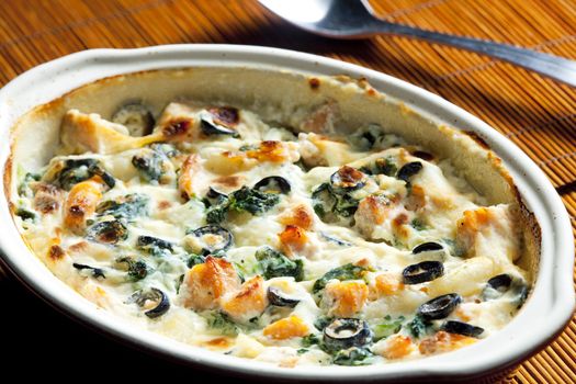 baked gnocchi with salmon, spinach and black olives