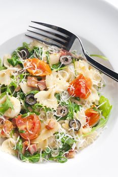 pasta farfalle with Parma ham and cherry tomatoes