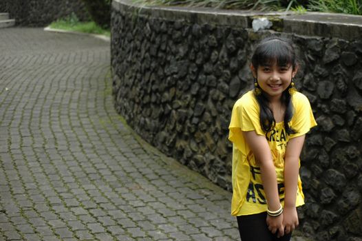 little asian girl with nice smile expression