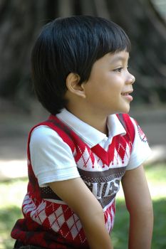 little boy with nice and cute face expression