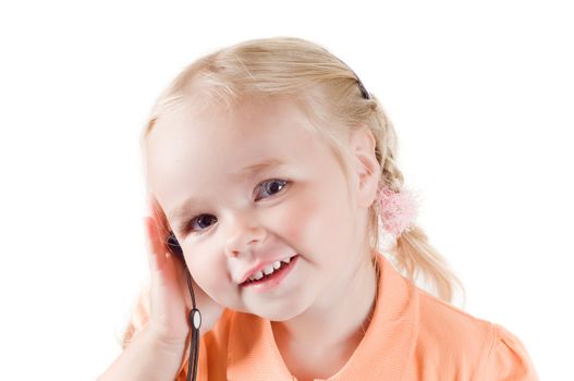 Shot of little girl with mobile in studio