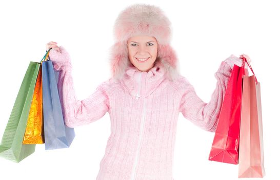 Beautiful woman in pink fur hat, isolated on white