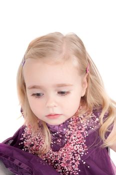 Studio shot of baby girl in lilac gala dress