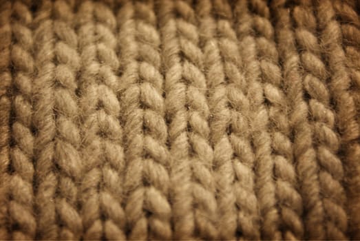 gray background of knitted wool scarf