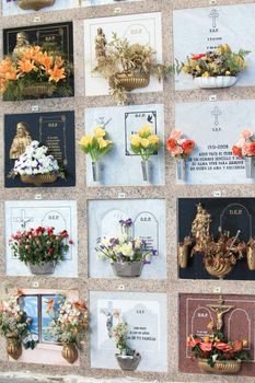 Flowers and gravestones on a Spanish cemetery