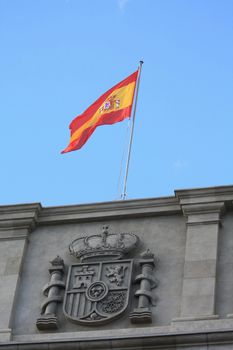 A red and yellow Spanish flag on a government building in Santa Cruz de Tenerife