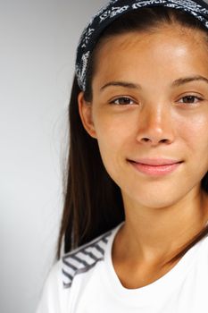 Fitness woman portrait of beautiful mixed asian / caucasian model