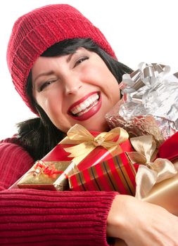 Happy, Attractive Woman Holds Holiday Gifts Isolated on a White Background.