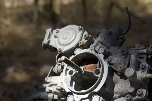 Old rusty motor in front of nature background