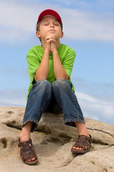 A child saying a prayer