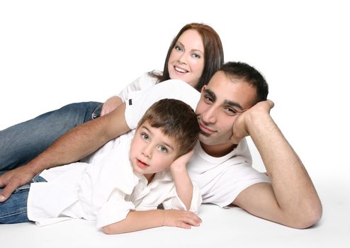 Casual family in jeans resting on the floor.