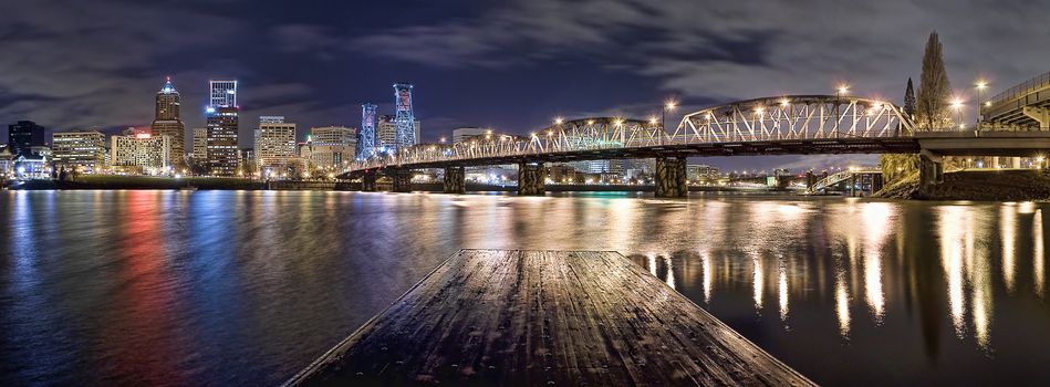 Portland, Oregon Panorama.  Night scene with light reflections on the Willamette River