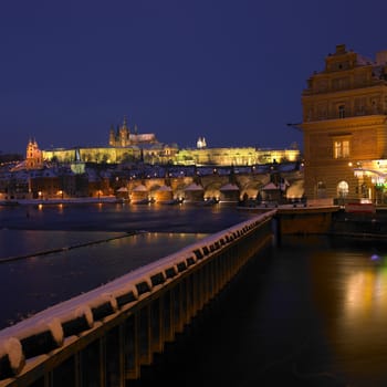 Lavka and Prague Castle with Charles bridge in winter, Prague, Czech Republic