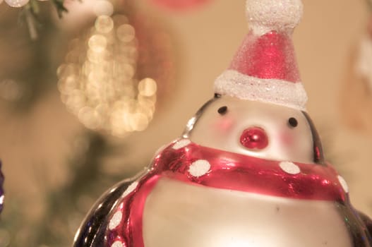 A glass penguin ornament with shallow depth of field. 