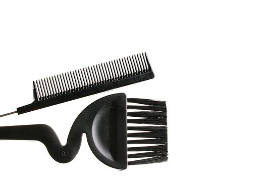 Hairbrush and brush for painting of hair in salon and a hairdressing salon.